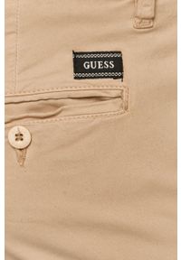 Guess - Spodnie. Kolor: beżowy. Materiał: tkanina. Wzór: gładki #3