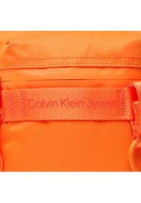 Calvin Klein Jeans Saszetka Ultralight Reporter 18 Nylon K50K509817 Pomarańczowy. Kolor: pomarańczowy. Materiał: materiał #5