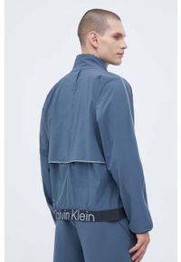 Calvin Klein Performance kurtka sportowa kolor szary przejściowa. Kolor: szary. Materiał: materiał. Długość rękawa: raglanowy rękaw. Długość: długie. Styl: sportowy #3