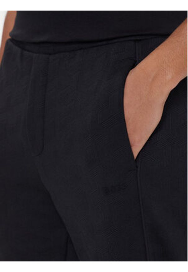 BOSS Spodnie dresowe Mirror Long 50549713 Czarny Regular Fit. Kolor: czarny. Materiał: syntetyk