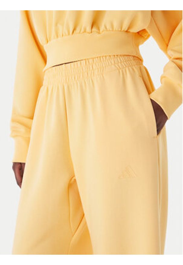 Adidas - adidas Spodnie dresowe Soft Lux KA7020 Pomarańczowy Loose Fit. Kolor: pomarańczowy. Materiał: syntetyk