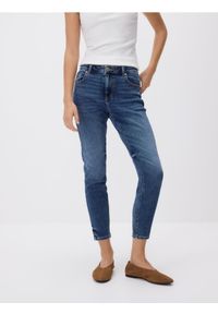 Reserved - Jeansy slim - niebieski. Kolor: niebieski