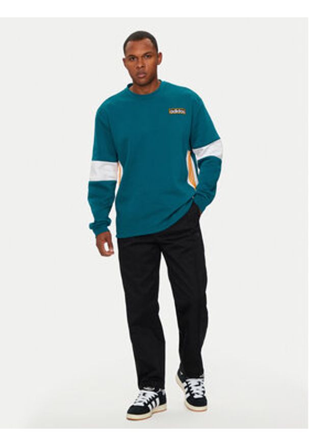 Adidas - adidas Spodnie dresowe CS Chino IY2074 Czarny Regular Fit. Kolor: czarny. Materiał: bawełna