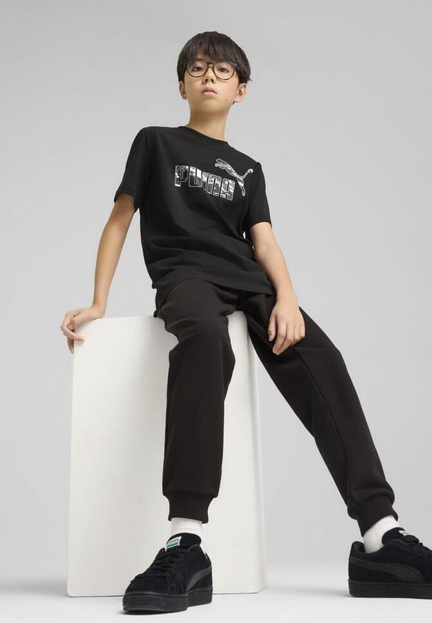 Puma - Młodzieżowa koszulka Essentials Camo PUMA Black. Kolor: czarny. Wzór: moro. Sport: joga i pilates