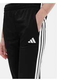 Adidas - adidas Spodnie dresowe Tricot 3-Stripes JF3383 Czarny Regular Fit. Kolor: czarny. Materiał: syntetyk