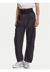 Adidas - adidas Spodnie dresowe JJ0920 Szary Loose Fit. Kolor: szary. Materiał: syntetyk #1