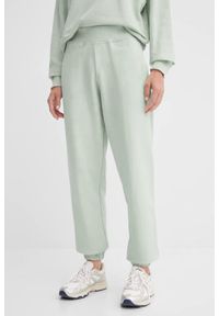Guess - GUESS Zielone spodnie dresowe damskie Primula, Rozmiar S. Kolor: zielony. Materiał: dresówka #1