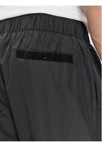 Puma Spodnie dresowe 53566301 Czarny Regular Fit. Kolor: czarny. Materiał: syntetyk #4