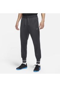 Spodnie męskie treningowe Nike Strike Jogging Pants szare. Kolor: wielokolorowy, biały, szary. Sport: bieganie