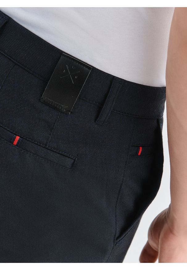 Pako Lorente - PAKO LORENTE – Spodnie męskie granatowe P000B-WX-215-G-S. Okazja: na co dzień. Kolor: niebieski. Materiał: poliester, elastan, wiskoza. Wzór: gładki. Styl: casual