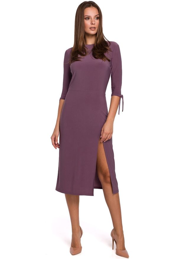 Makover - Elegancka sukienka prosty fason z rozcięciem. Okazja: na co dzień. Materiał: dzianina. Wzór: gładki. Typ sukienki: proste. Styl: elegancki, casual. Długość: midi