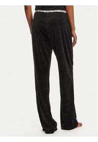 Juicy Couture Spodnie piżamowe Vicky JCLAS125504 Czarny Flare Fit. Kolor: czarny. Materiał: syntetyk