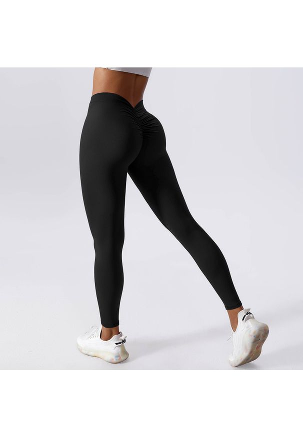 Intica - Legginsy z drapowaniem na trening i co dzień Ingedore. Kolor: czarny. Materiał: materiał, skóra. Wzór: gładki. Sport: fitness