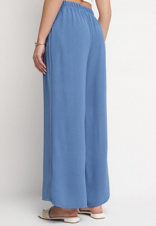 Born2be - Niebieskie Spodnie Palazzo o Szerokim Kroju z Wysokim Stanem Aravenna. Okazja: na co dzień. Stan: podwyższony. Kolor: niebieski. Wzór: aplikacja. Styl: elegancki, casual