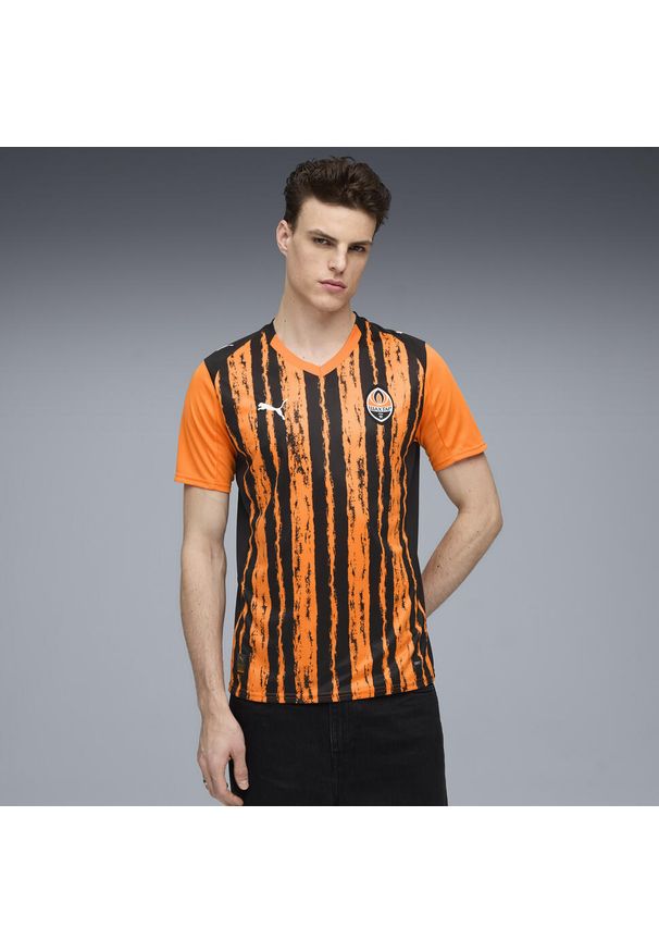 Puma - Męska koszulka domowa FC Shakhtar Donetsk 25/26 PUMA Rickie Orange Black. Kolor: czarny, pomarańczowy, wielokolorowy, żółty. Sport: piłka nożna