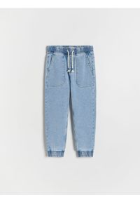 Reserved - Jeansy jogger - niebieski. Kolor: niebieski
