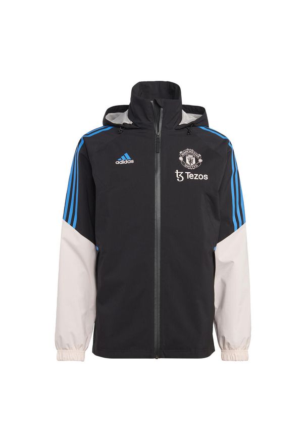 Kurtka do piłki nożnej męska Adidas Manchester United Condivo 22 Storm. Kolor: czarny, różowy, wielokolorowy. Materiał: materiał