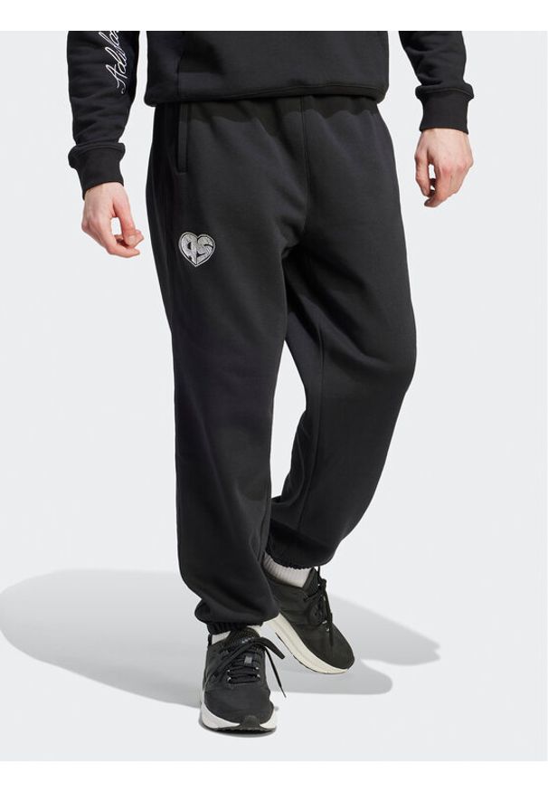 Adidas - adidas Spodnie dresowe HY1288 Czarny Loose Fit. Kolor: czarny. Materiał: bawełna, dresówka