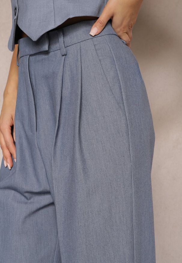 Renee - Niebieskie Spodnie High Waist w Garniturowym Stylu z Kieszeniami Junife. Stan: podwyższony. Kolor: niebieski
