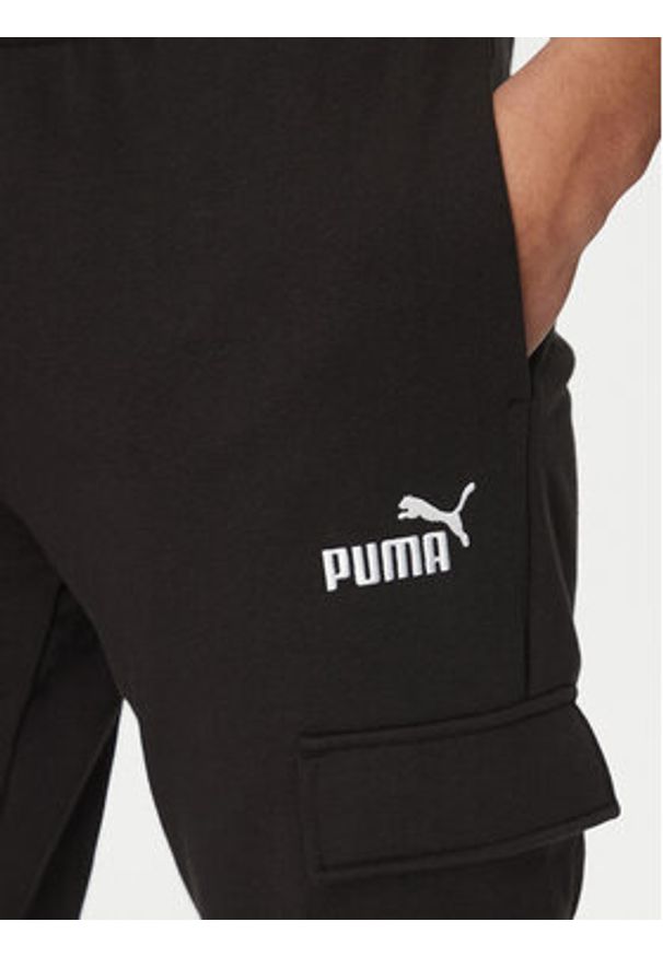 Puma Spodnie dresowe Ess No. 1 Logo Cargo 682661 Czarny Regular Fit. Kolor: czarny. Materiał: bawełna
