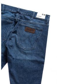 Wrangler - SPODNIE MĘSKIE WRANGLER LARSTON BASEMENT BLUE W18SHY32C. Stan: obniżony