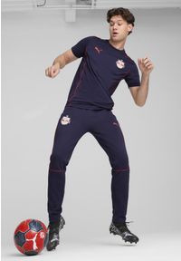 Puma - Męskie spodnie Casuals FC Red Bull Salzburg PUMA Navy Red Blue. Kolor: czerwony, wielokolorowy, niebieski. Materiał: materiał