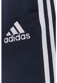 Adidas - adidas Spodnie GK8977 męskie kolor granatowy gładkie. Kolor: niebieski. Materiał: bawełna, materiał. Wzór: gładki #4