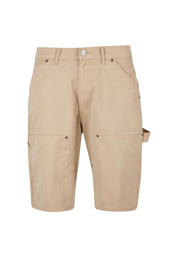 Szorty bermudzkie Urban Classics Carpenter. Kolor: beżowy. Długość: krótkie. Sezon: lato