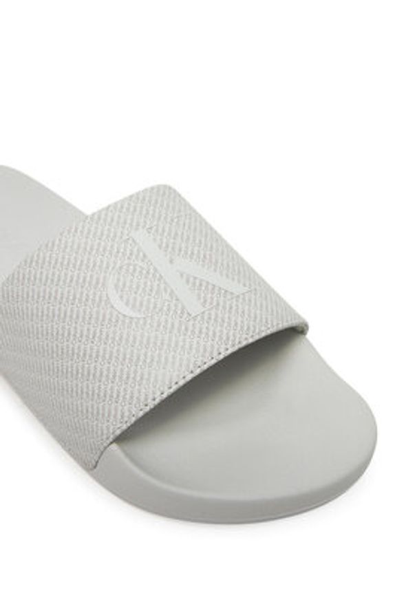 Calvin Klein Jeans Klapki Slide Aop Print YM0YM01269 Szary. Kolor: szary. Materiał: syntetyk. Wzór: nadruk