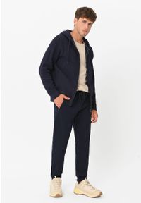 Volcano - Joggery dresowe N-BEN. Kolor: niebieski. Materiał: dresówka. Wzór: napisy, gładki. Sport: fitness #1