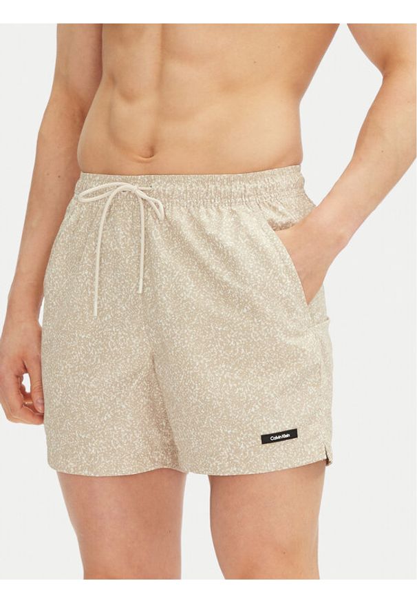 Calvin Klein Swimwear Szorty kąpielowe KM0KM01120 Beżowy Regular Fit. Kolor: beżowy. Materiał: syntetyk