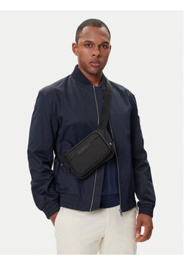 TOMMY HILFIGER - Tommy Hilfiger Saszetka nerka Th Repreve Bumbag AM0AM13467 Czarny. Kolor: czarny. Materiał: materiał
