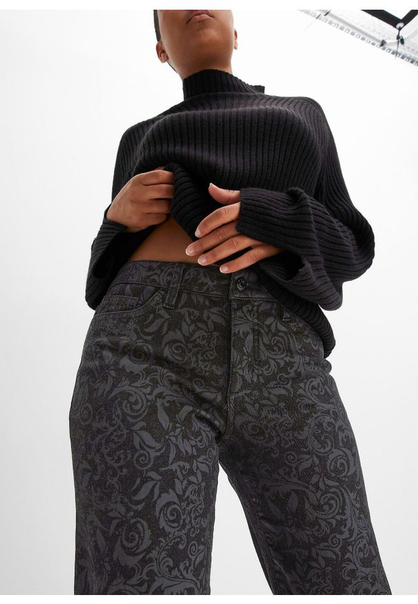 bonprix - Dżinsy Marlena z połyskującym nadrukiem. Kolor: czarny. Wzór: nadruk