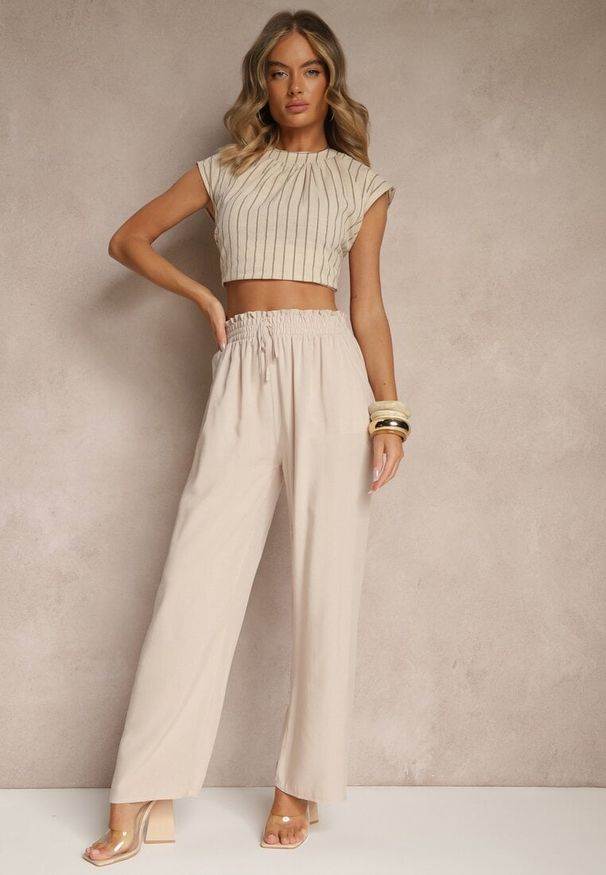 Renee - Beżowe Szerokie Spodnie z Wiskozy Ozdobione Wiązaniem Toleassa. Okazja: na co dzień. Kolor: beżowy. Materiał: wiskoza. Wzór: aplikacja. Styl: casual