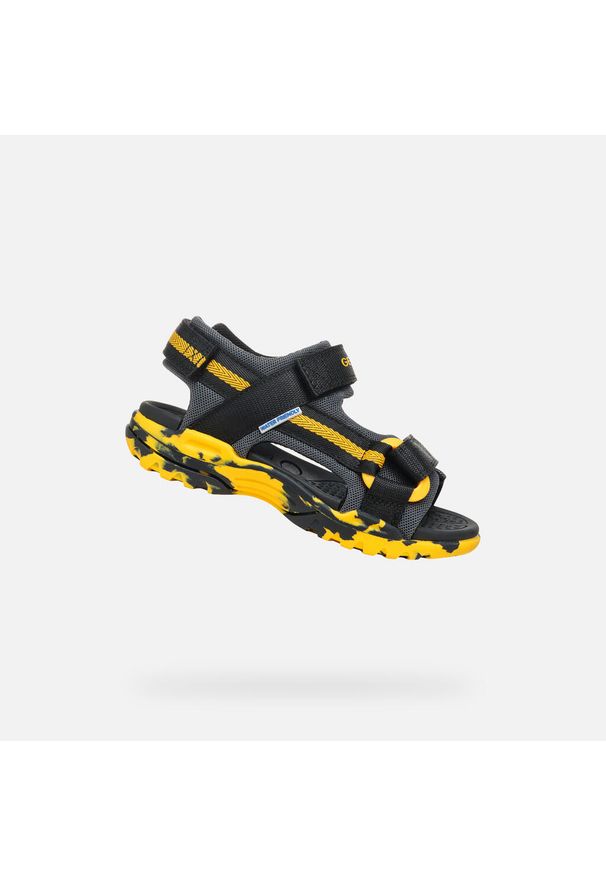 Sandały Geox Model J Borealis B Kolor Czarny. Kolor: czarny, wielokolorowy, żółty. Materiał: tkanina. Sport: turystyka piesza