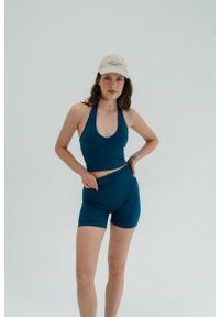 MOONHOLI - Krótkie spodenki do jogi Moonholi Malibu Mornings modelujące z efektem push up. Kolor: niebieski. Długość: krótkie. Sport: joga i pilates