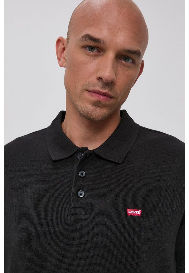 Levi's® - Levi's - Polo. Okazja: na co dzień, na spotkanie biznesowe. Typ kołnierza: polo. Kolor: czarny. Materiał: dzianina, materiał. Długość: krótkie. Wzór: gładki. Styl: biznesowy, casual