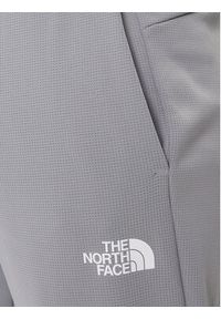 The North Face Spodnie dresowe Reaxion 2.0 NF0A8DRS Szary Regular Fit. Kolor: szary. Materiał: syntetyk #5