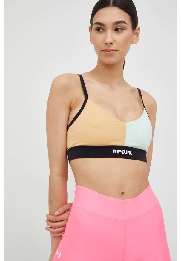 Rip Curl biustonosz sportowy mirage run swim surf kolor turkusowy gładki. Kolor: turkusowy. Materiał: skóra, materiał. Rodzaj stanika: wyciągane miseczki. Wzór: gładki. Sport: bieganie