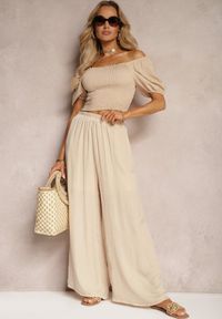 Renee - Beżowe Wiskozowe Spodnie Szerokie High Waist Rissalene. Okazja: do pracy, na spotkanie biznesowe. Stan: podwyższony. Kolor: beżowy. Materiał: wiskoza. Styl: elegancki, biznesowy