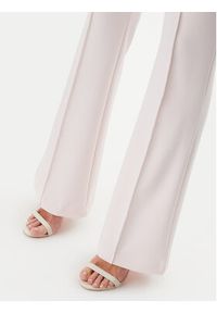 Guess Spodnie materiałowe W4YB01KCBO2 Różowy Flare Fit. Kolor: różowy. Materiał: syntetyk #2