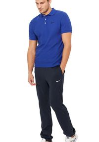 Spodnie Dresowe Sportowe Męskie Nike Bawełniane Regular. Kolor: niebieski. Materiał: dresówka, bawełna. Sport: fitness