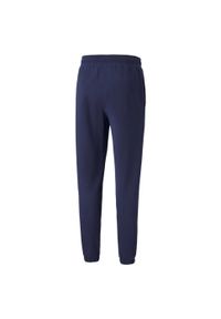 Spodnie Puma Rad Cal Pants Dk Cl, Mężczyźni. Kolor: niebieski. Materiał: materiał, bawełna