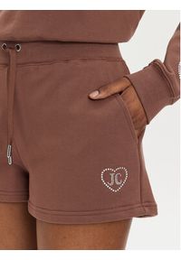 Juicy Couture Szorty sportowe Sully Rodeo JCBHS223825 Brązowy Regular Fit. Kolor: brązowy. Materiał: bawełna