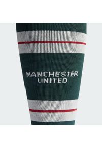 Adidas - Getry Manchester United 23/24 Away. Kolor: biały, zielony, czerwony, wielokolorowy. Materiał: materiał