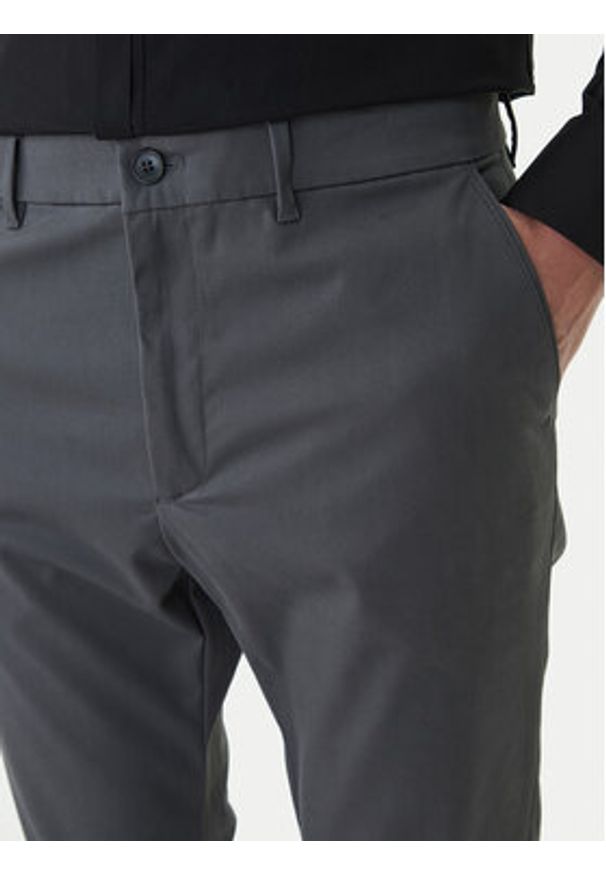 Calvin Klein Chinosy LV04LD613G Szary Slim Fit. Kolor: szary. Materiał: bawełna