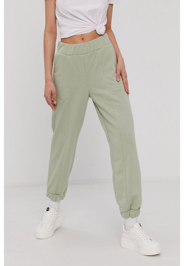Pieces Spodnie damskie kolor zielony melanżowe. Kolor: zielony. Materiał: bawełna. Wzór: melanż
