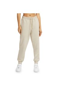 Spodnie dresowe Lifestyle damskie SIROKO Sand-W. Kolor: beżowy. Materiał: dresówka. Sport: fitness #1
