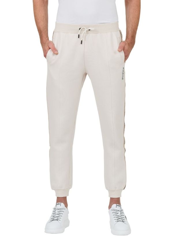 Guess - GUESS Beżowe męskie spodnie Mickey Cuff Pant, Rozmiar S. Kolor: beżowy
