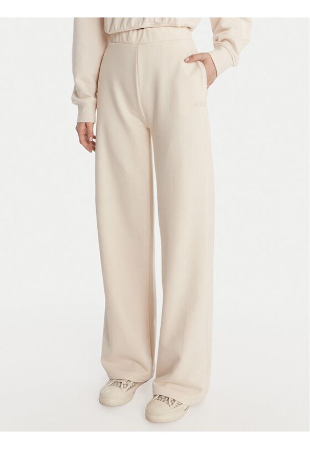 Guess Spodnie dresowe V6RB03 KD761 Kremowy Wide Leg. Kolor: kremowy. Materiał: bawełna